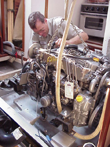 Peter Haywood working on Yanmar marine engine